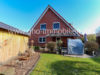 Carport und Gartenansicht